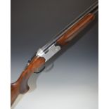 Beretta 686 Special 12 bore over and under ejector shotgun with with all over floral engraving,