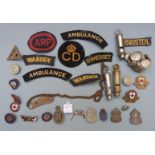 British WW2 Home Front ephemera including three A.R.P silver badges, buttons, whistles, cloth badges