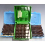 Two-hundred-and-fifty-seven 7.62mm/.308 rifle cartridges together with various empty cases, in three