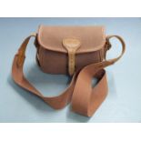 Brady leather and canvas shotgun cartridge bag with shoulder strap.