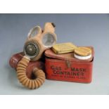 British WW2 gas mask by Avon dated 9/10/40 with broad arrow mark, two anti gas ointment containers