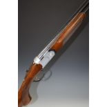 Beretta 686 Special 20 bore over and under ejector shotgun with with all over floral engraving,