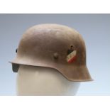 German WW2 steel helmet with two decals, replacement inner