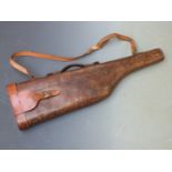 Vintage leather leg of mutton gun case with shoulder strap and fitted interior, 78cm long.