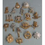 Nineteen British Army Dragoon Guards/Dragoons cap badges including 5th Kings Dragoon Guards (J R