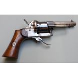 Belgian 7mm pinfire six-shot double action revolver with shaped wooden grips, folding trigger and