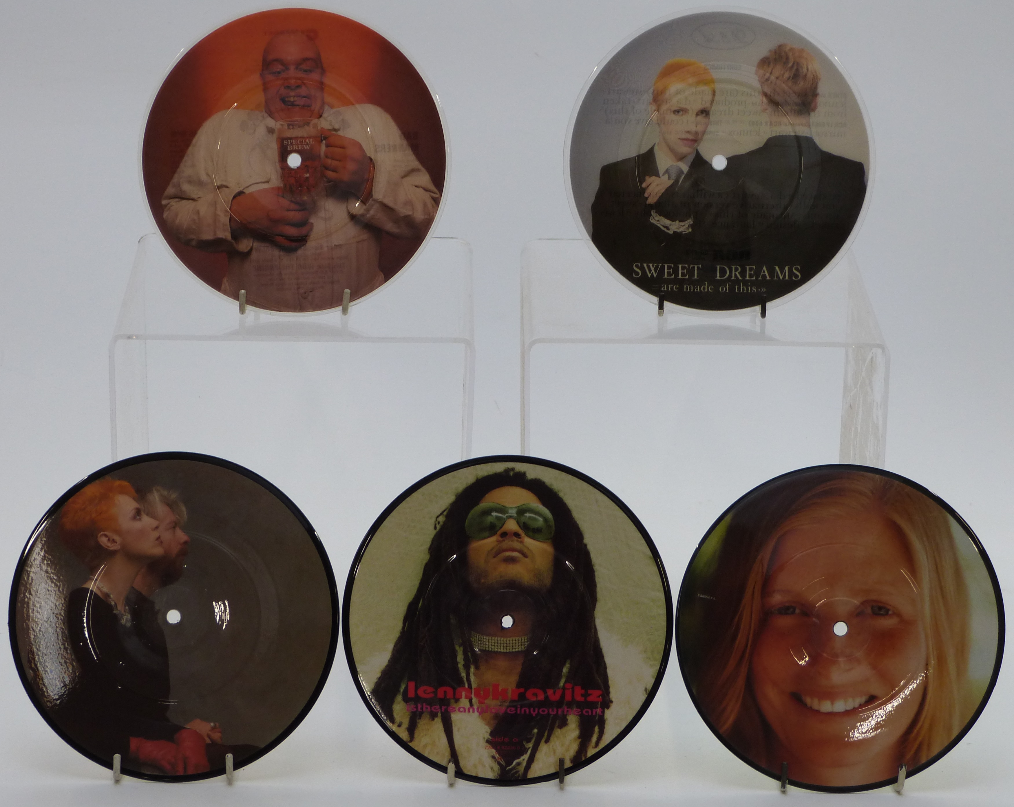 Twenty one 7 inch picture disc singles including Bad Manners, Adam Ant, Eurythmics, Lenny Kravitz,