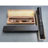 Greenkat 9-30x30 spotting or rifle scope in original box, together with a shotgun cleaning kit in