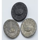 Three German WW2 Third Reich Nazi Wound badges, one marked '26' to reverse, another '3'