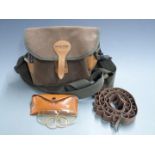 Jack Pyke leather shotgun cartridge bag together with a pair of Stirling shooting glasses in leather