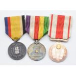 Three Japan medals comprising Manchuko National Foundation medal, Taisho Enthronement medal and