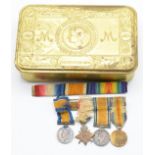 WW1 Princess Mary Christmas tin together with four miniature medals and ribbons