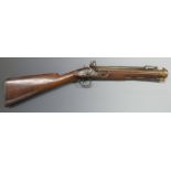 W Ketland & Co flintlock hammer action blunderbuss with sprung bayonet, named and engraved lock,