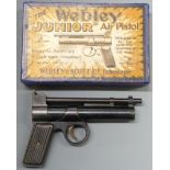 Webley Junior .177 air pistol with reeded metal grips, serial number J15557, in reproduction box