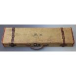 Vintage canvas and leather bound shotgun case with fitted interior and original label 'T.