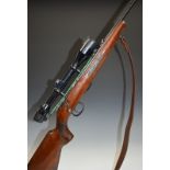 Anschutz model 1416 .22 bolt action rifle with chequered semi-pistol grip and forend, two spare