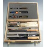 Mountaineer multi-gauge shotgun, rifle and pistol cleaning kit, in fitted wooden box.