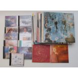 A collection of albums and CDs including Stevie Winwood, Traffic, Arthur Brown, Marianne