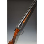 Laurona 12 bore side by side shotgun with engraved lock, trigger guard, underside, thumb lever,