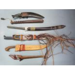 Five bladed weapons including kukri, together with truncheon and whistle. PLEASE NOTE ALL BLADED