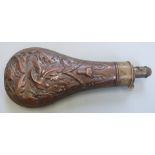 G & JW Hawksley copper and brass powder flask with embossed stags head and oak leaf decoration, 21cm
