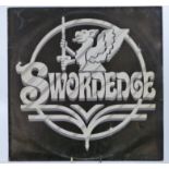 Swordedge - Swordedge (SW001) record appears Ex with wear to cover