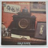 Idle Race - Time Is (SLRZ1017) record appears Ex, with tape residue on three seams of textured