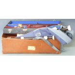 A large collection of whistles and recorders including a cased bass fruitwood soprano, Yamaha
