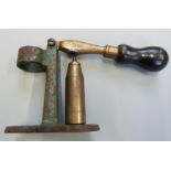 12 bore brass and metal shotgun cartridge capper and decapper with turned wooden handle.