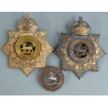 Two British Army other ranks blue cloth helmet plates for the Royal Lancaster Regiment and
