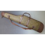 Padded shotgun or rifle slip with decoration of ducks and cartridge bags.