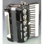 Parrot 120 bass piano accordion, 13 treble couplers and 4 bass couplers in black finish, in original