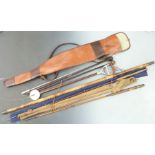 A sporting lot including gun slip, shooting stick, walking sticks made from gun cleaners, cane