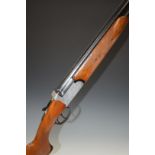 Contento 12 bore over and under shotgun with engraved locks, top plate and top lever, chequered