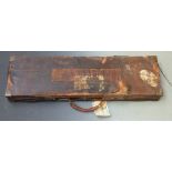 C B Vaughan leather bound gun case with brass lock and corners, fitted interior and original 'C B