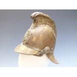 Brass Merryweather Fireman's helmet with crossed axes helmet plate, chin strap and liner