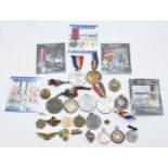 Small collection of medals and badges including Palestine Police 1932-1933, Dowbiggin Cup medal