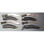 Four kukri knives two with GK & Co to ricasso, all with sheaths, largest blade 32cm. PLEASE NOTE ALL