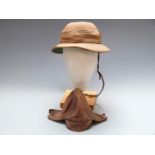 Hawkes & Co Ltd, Cork patent tropical hat, label size 6 3/4, together with a leather flying /