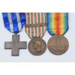 Three Italian WW1 medals including War Merit Cross medal, 1914-1919 War Medal with laurel leaf clasp