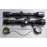 Two rifle scopes Simmons 21029 3-9x40 with scope mounts and lens covers and one other with scope