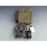 British Cold War era respirator/gas mask complete with de-contamination powder, pads and haversack