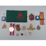 Small collection of badges including Royal Artillery, King's Royal Rifle Corps, On War Service 1916,