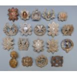 Nineteen British Army and Scottish Regiments badges including Royal Scots, Highland Light