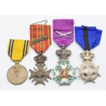 Four Belgium medals comprising Order of Leopold II, Military Order of Leopold II, Croix de Guerre