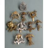 Ten British Army Lancer Regiments cap badges including 9th Lancers (J R Gaunt makers), 21st