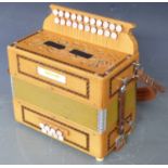 Saltarelle Berry melodeon D/G stepped keyboard, eight bass and 21 treble keys, inlaid fruitwood