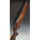 Anschutz .22 bolt-action rifle with semi-pistol grip, adjustable sights and 21.5 inch barrel,