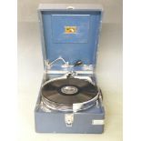 His Master's Voice c1950 portable wind-up gramophone with 11 popular 78rpm records including Danny