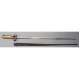 French Lebel 1886/93 bayonet with brass grip, stamped F.C to 51cm cruciform blade, with scabbard.
